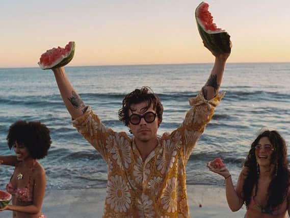 Harry Styles wearing Gucci sunglasses in Watermelon Sugar