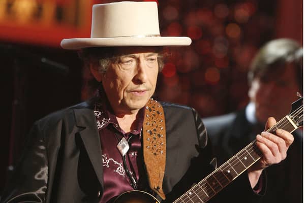 Bob Dylan has issued a rare public apology for selling books with automated signatures.  