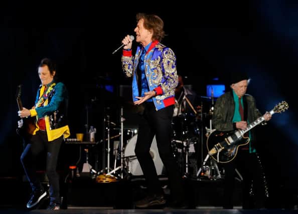 Guitarist Ronnie Wood, singer Mick Jagger and guitarist Keith Richards of The Rolling Stones perform during a stop of the band's No Filter tour (Photo: Ethan Miller/Getty Images)