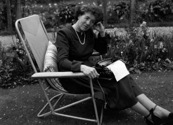 Children's writer Enid Blyton sitting in her garden in Beaconsfield, Buckinghamshire (Photo: George Konig/Getty Images)