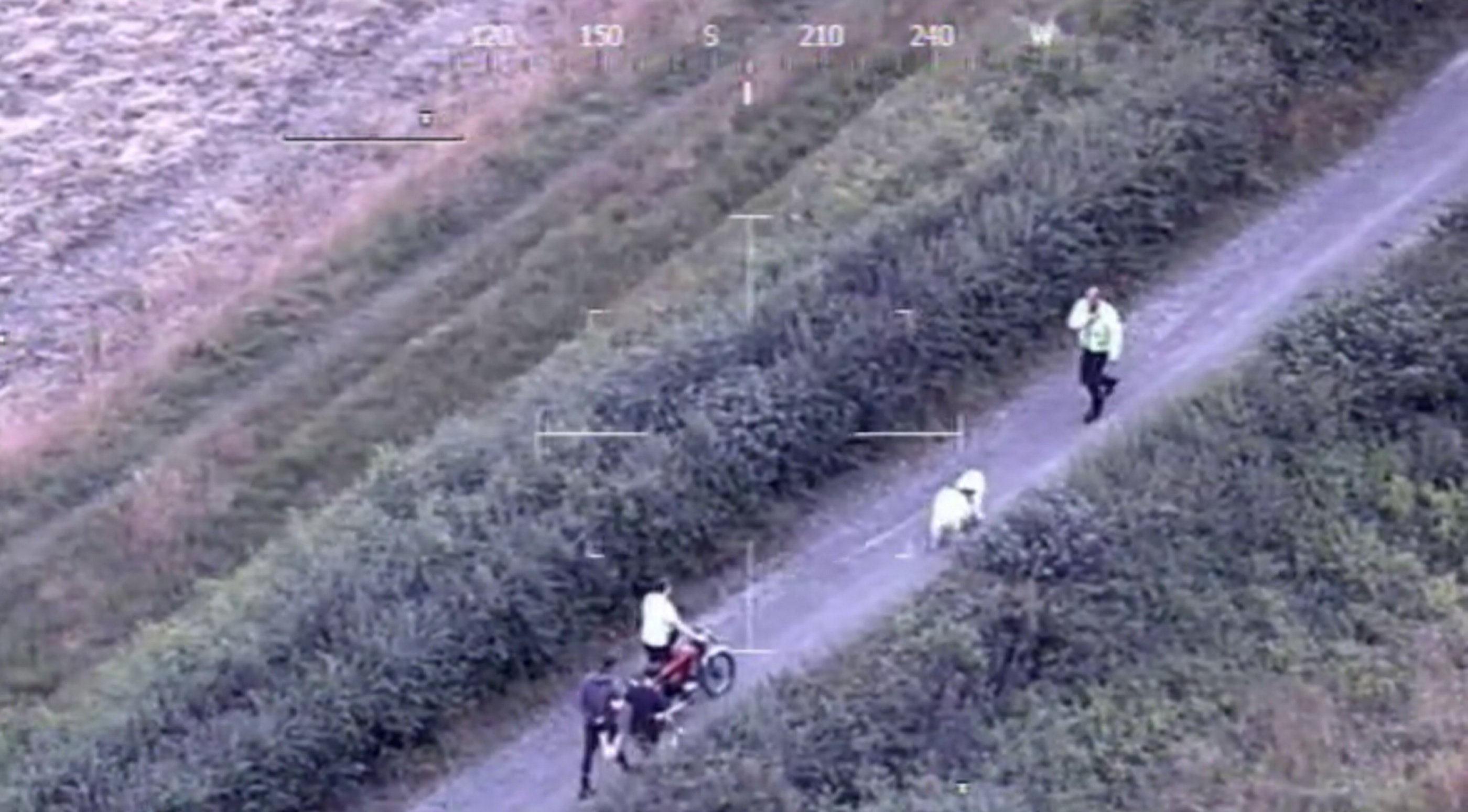 Dramatic moment teen yob shoved off motorbike by off-duty cop walking ...