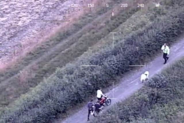 Dramatic moment teen yob shoved off motorbike by off-duty cop walking ...