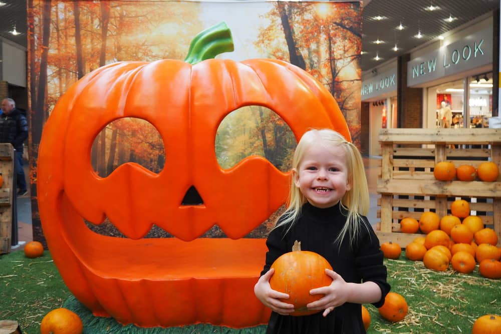 Little shopper enjoying the Pumpkin Patch Party