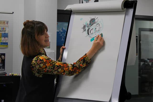 Kate Pankhurst teaching Duke's Secondary students the art of illustration.
