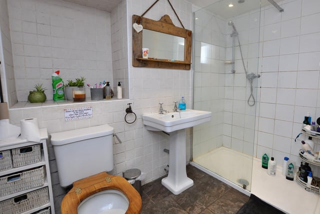 Shower room with wash basin and w.c..