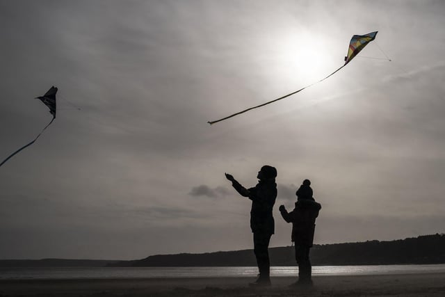 Scarborough beach saw people making the most of the windy conditions by flying kites ahead of the worst of Storm Dudley which is expected to hit the Yorkshire coastline later on Wednesday night. PA