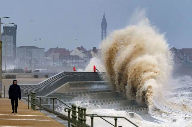 Waves crashing on the seafront at Blackpool as Storm Dudley hits the north of England Wednesday night into Thursday morning, closely followed by Storm Eunice, which will bring strong winds and the possibility of snow on Friday. PA