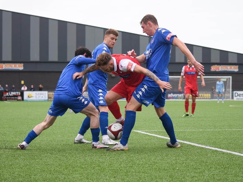 Nathan Cartman is outnumbered by Witton defenders

Photo by Morgan Exley