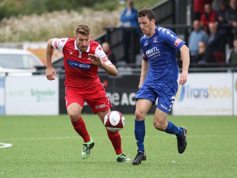 Simon Heslop looks to track a Witton player

Photo by Morgan Exley