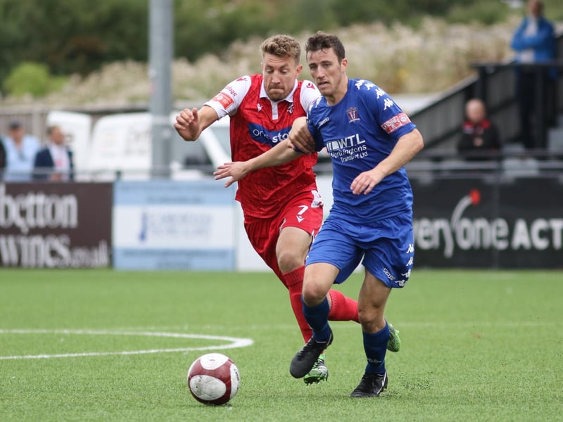 Simon Heslop battles for the ball

Photo by Morgan Exley