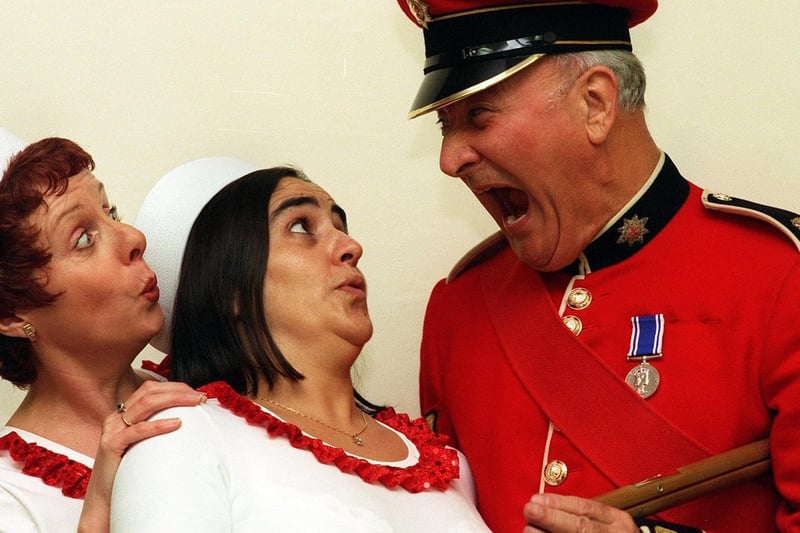 Former  Coldstream Guards drill instructor turned Leeds Amateur Operatic Society actor Roy Walker gets fellow cast members Janet Page (left) and Nadia Murrell in shape ahead of staging The Musical Years.