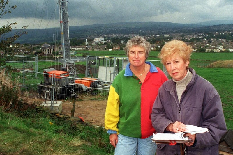 Local residents, Amanda Taylor (left) and Sue Seeger infront of a telephone mast on The Billing at Rawdon, which was being put up despite a petition of more than 500 signatures against it.