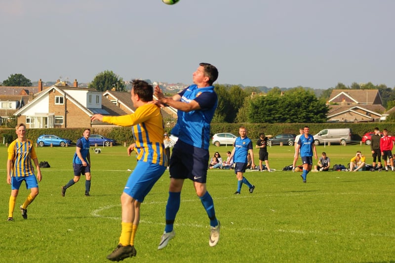 Veterans Chris Stubbings and Paul Watson compete for the ball