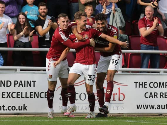 Danny Rose celebrates the opening goal with his team-mates. Pictures: Pete Norton.