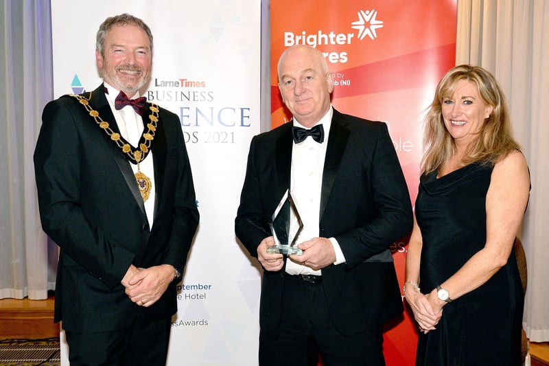 The prestigious Business Person of the Year award went to David Hunter, centre. Also included are Mayor of Mid and East Antrim Council, Councillor William McCaughey and Grace Clements, media sales advisor  from the Larne Times. INLT37-235.