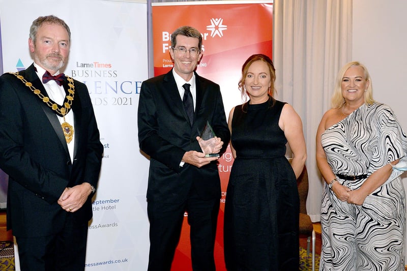 The Excellence in Innovation Award was won by Raptor Photonics with the prize being accepted by, Mark Donaghy, second from left, Also included are from left, Mayor of Mid and East Antrim Council, Councillor William McCaughey, Emma McAnespie, HR consultant from category sponsor, Caterpillar (NI) Limited, and Lisa Irvine, account manager, Larne Times. INLT37-231.