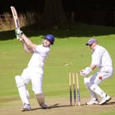 A cramlington wicket falls at Rock and a home bowler sends down a delivery.