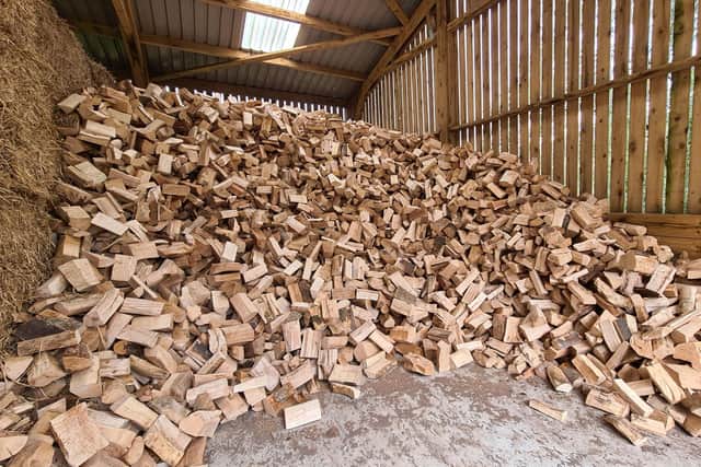 The firm delivers barn seasoned softwood and hardwood logs.