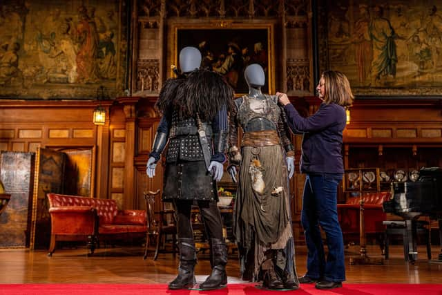 Karen Larkin with two of the main character costumes from the Netflix series The Last Kingdom.