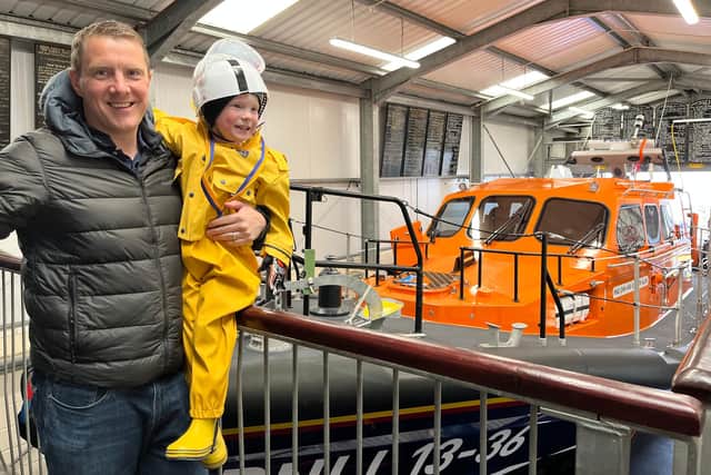Jay MacPherson with his dad Tom at Seahouses lifeboat station.