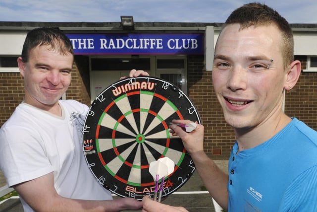Jamie Allan and Aaron Smith prepare for darts at The Radcliffe Club in 2011.