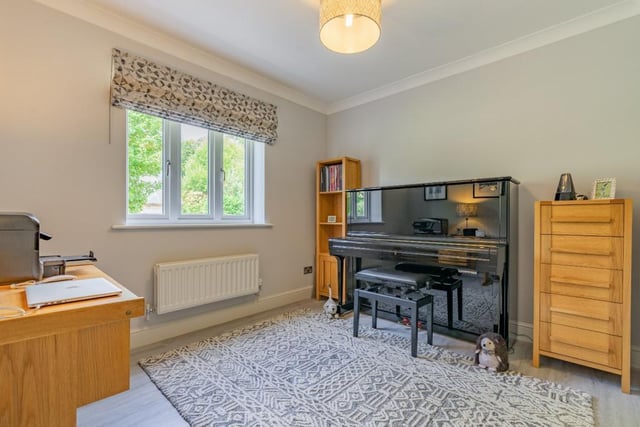 The ground floor accommodation also offers a further reception room, which is currently in use as a music room.