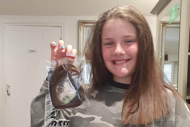 Jessica Smith, nine, is donating nine inches of hair to the Little Princesses Trust, which provides real hair wigs to children undergoing cancer treatment.