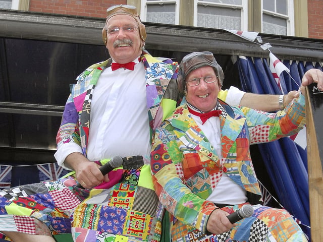 Likely lads: Rain didn't dampen the spirits of comperes Mick Watson and John Beynon.