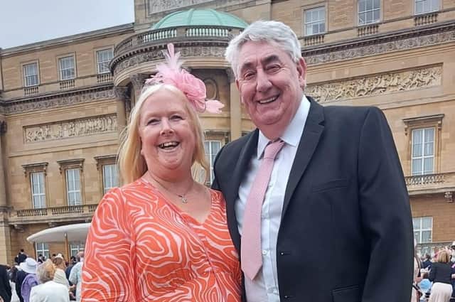 Ed Stoker and Linda Summerly at Buckingham Palace.