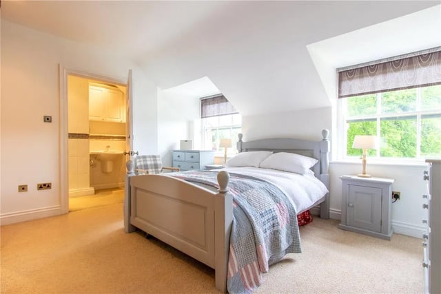 The principal bedroom has an extensive range of fitted wardrobes plus an en-suite with shower.
