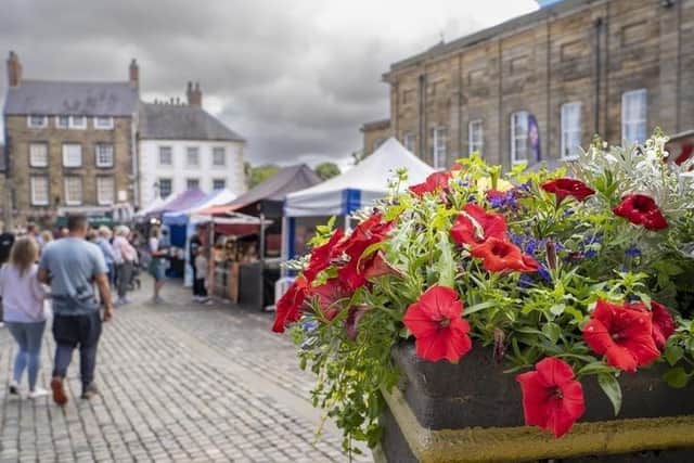 Floral displays in Alnwick's Market Place. Picture: Jane Coltman