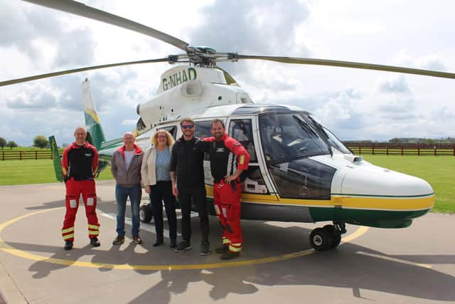 (From left to right) Pilot Nigel Lynch, Mick, Pepi and Dan Mackay and paramedic Lee Salmon
