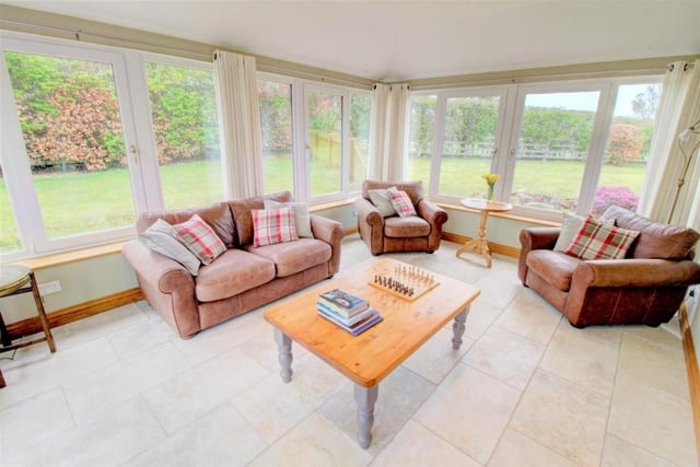 The garden room is finished with a lovely tiled limestone floor which benefits from electric underfloor heating.