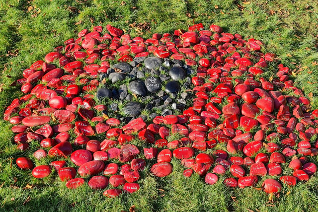 Explorer Scouts from Castle Morpeth District created a stone poppy, made up of red and black stones, to honour the fallen from Morpeth.
