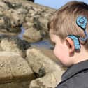 Having the fun Hearoes stickers on a cochlear implant or hearing aid can help encourage children to wear them.