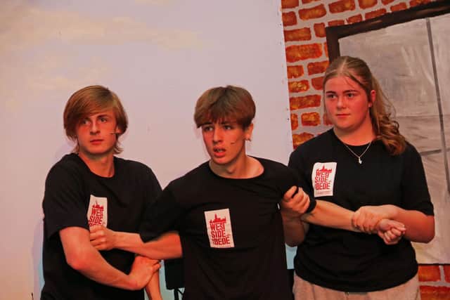 Bede Academy pupils on stage performing West Side Story. (Photo by Bede Academy)