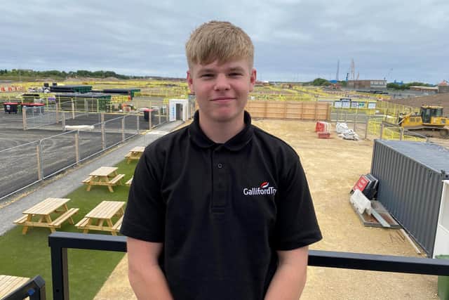Robbie Gleghorn, 17, at his new work site. (Photo by Galliford Try)