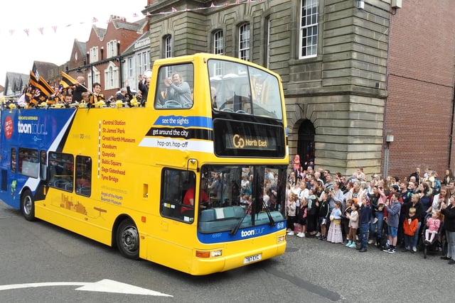 The parade included an open top bus carrying Morpeth Town FC representatives.