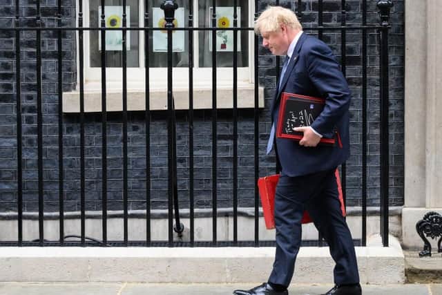 Prime Minister Boris Johnson leaves 10 Downing Street on May 26. Picture: Leon Neal/Getty Images.