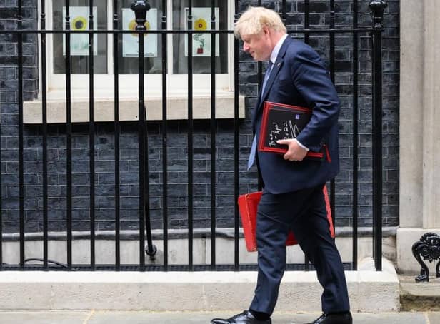 Prime Minister Boris Johnson leaves 10 Downing Street on May 26. Picture: Leon Neal/Getty Images.