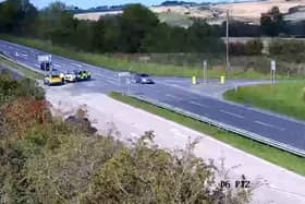 Police cars stop a car after it turned onto the wrong side of the dual carriageway on the A1 in Northumberland. Photo: Claire Barber PR