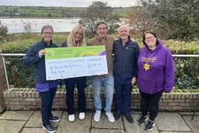 Michael Taylor, HospiceCare family member with Ben and Georgie McHugh, of The Red Lion Inn with Emma Arthur, Sarah Morey and Stuart Cable of HospiceCare.