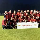 Champions - Newbiggin celebrate their NFA Minor Cup win on Friday.