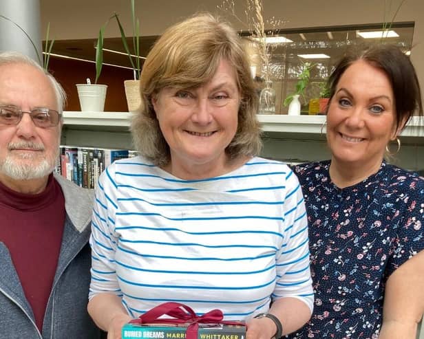 From left, Frank Rescigno (Greater Morpeth Development Trust), Pam Frain and Morpeth librarian Sarah Jayne Kennedy-Robson.