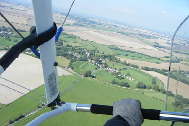 Stock image showing a view from a microlight in flight
