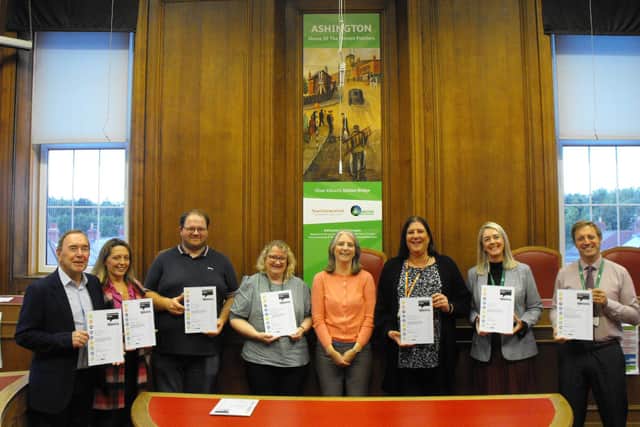Town council representatives and officers collect their carbon literate certificates. (Photo by Ryan Appleby)
