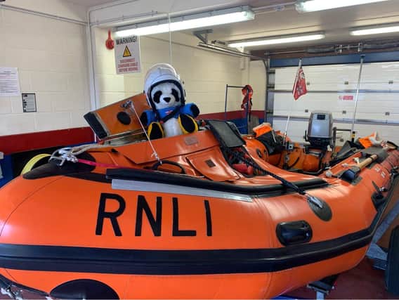 A raffle organised by Amble Pin Cushion offers Ronnie, the RNLI panda, as a prize.