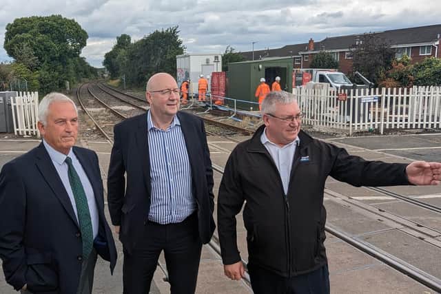 Council Leader Glen Sanderson (left) with Pieter Esbach and Neal McKenzie from Morgan Sindall observe work getting underway. (Photo by NCC)