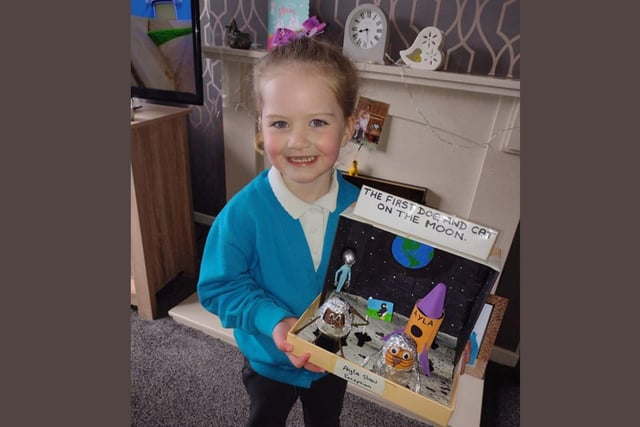Ayla Shaw, age 4, shows off her travelling cat and dog.