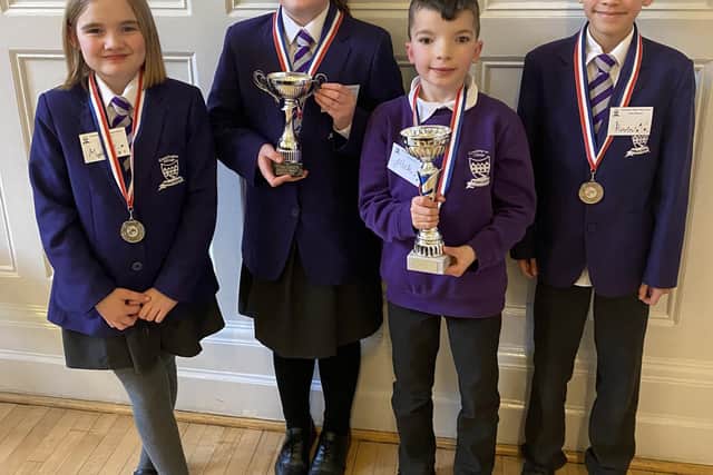 The Cramlington Village Primary School team with their silverware after winning the Britannica Magazine Schools Quiz Challenge.